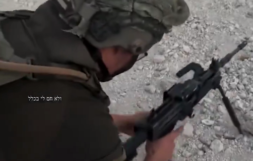Thumbnail preview image for the video titled: Israeli soldier sets up a shooting range at a youth center in the West Bank
